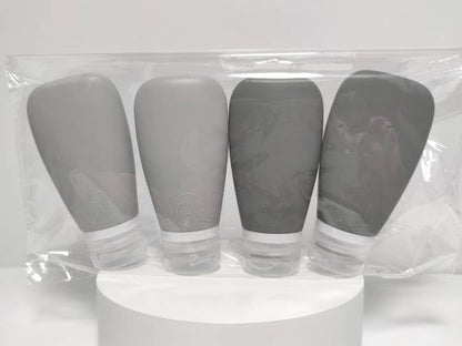 Travel Bottles for Toiletries, TSA Approved 3oz Leak Proof Silicone Soft Refillable Squeeze Travel Size Containers BPA Free for Cleansers, Lotions, Shampoo, Conditioner 4pk (2Black-2Gray)